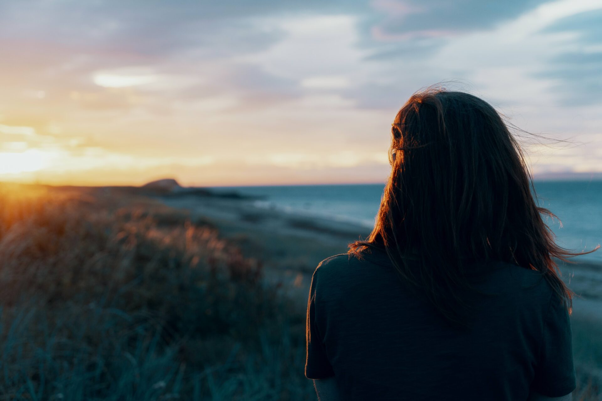 woman watching sunrise